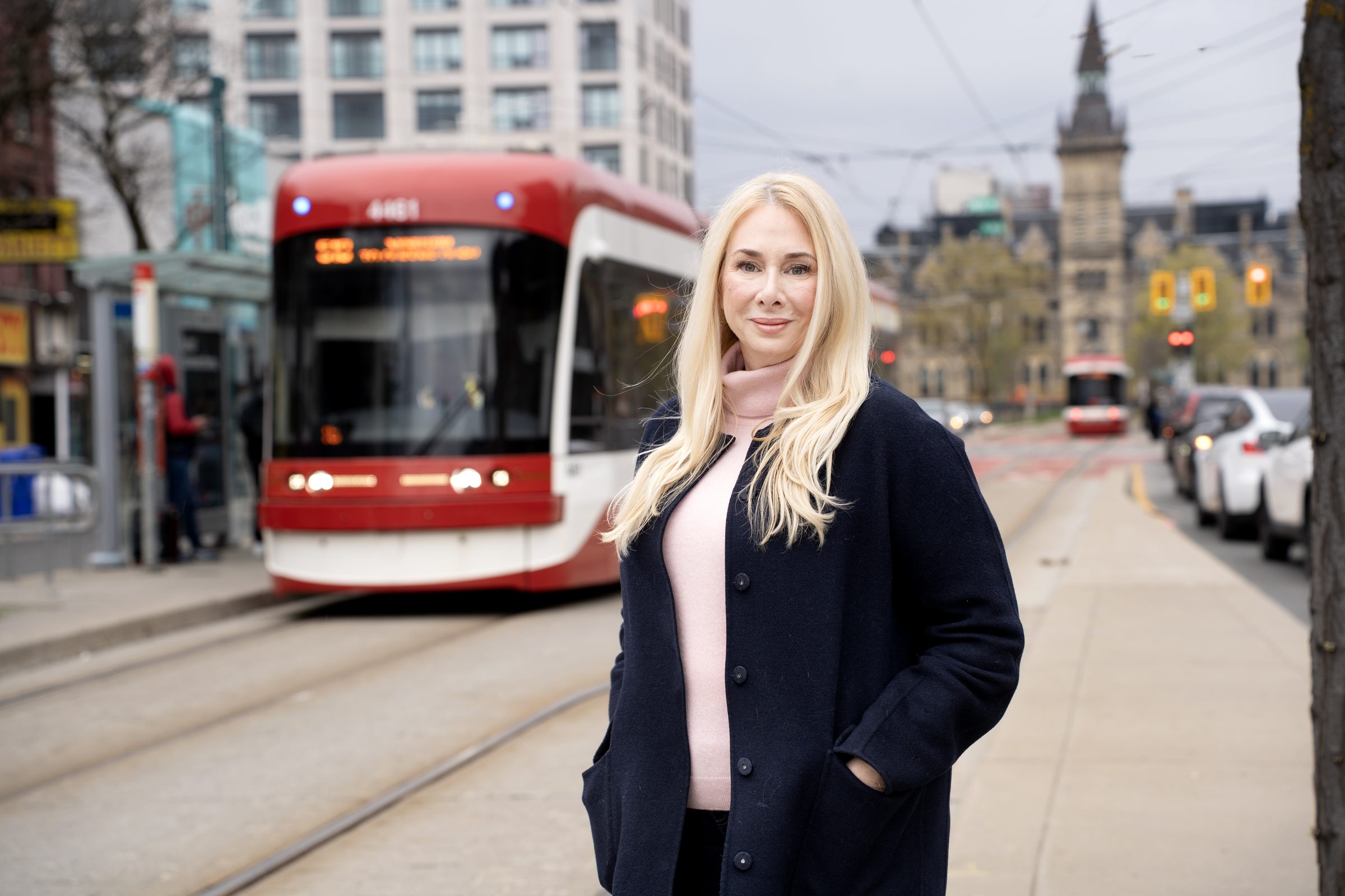 Karina Lemke in front of a Toronto streetcar in University–Rosedale